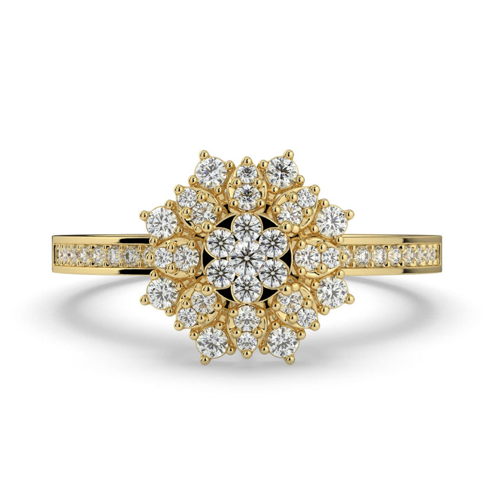 A floral-inspired diamond cluster ring featuring pear-shaped diamonds surrounding a round center, set on a diamond-encrusted band for a radiant, blooming effect.