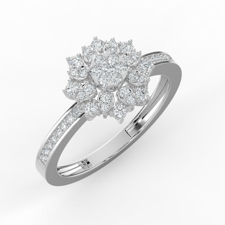 A floral-inspired diamond cluster ring featuring pear-shaped diamonds surrounding a round center, set on a diamond-encrusted band for a radiant, blooming effect.