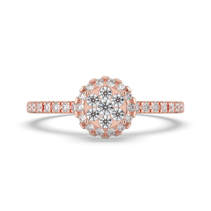 A diamond ring featuring a round floral cluster center, surrounded by a halo of pavé-set diamonds, with a pavé-set band for added sparkle.