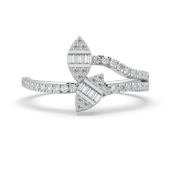 A diamond ring featuring two marquise-shaped clusters of baguette and round diamonds, set on a bypass pavé-set band for a modern, elegant design.