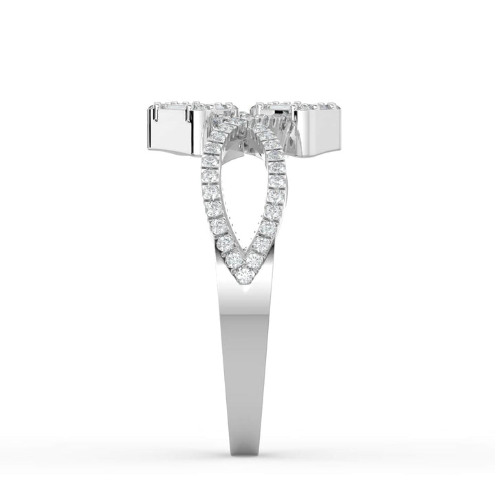 A diamond ring featuring two square clusters of baguette and round diamonds, with a pavé-set infinity-style band for added elegance.