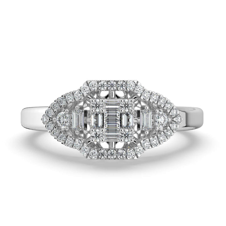 A vintage-inspired diamond ring featuring a combination of baguette and round diamonds in a marquise-shaped design, with a pavé-set halo and a polished band.