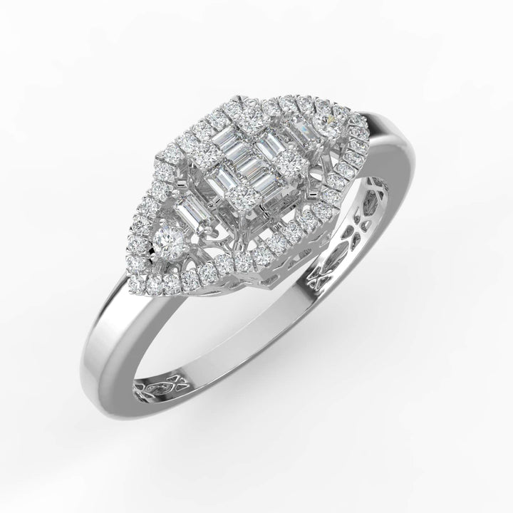 A vintage-inspired diamond ring featuring a combination of baguette and round diamonds in a marquise-shaped design, with a pavé-set halo and a polished band.