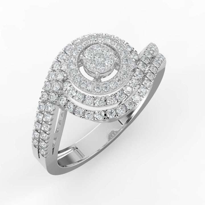 A diamond ring featuring a round cluster center, surrounded by concentric halos of pavé-set diamonds, with a split pavé-set band for added brilliance.