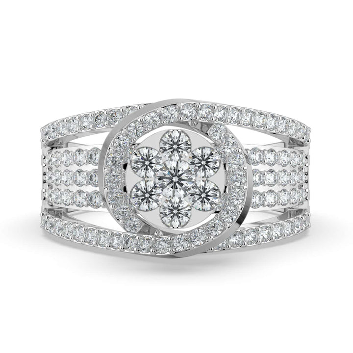 A bold diamond ring featuring a floral cluster center surrounded by a crescent halo, with a wide multi-row pavé-set diamond band.