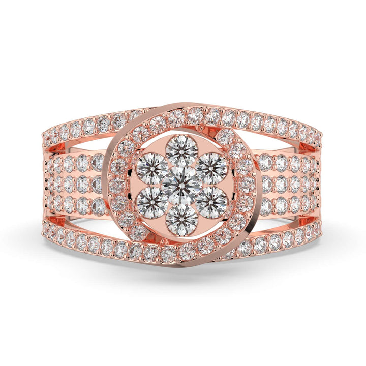 A bold diamond ring featuring a floral cluster center surrounded by a crescent halo, with a wide multi-row pavé-set diamond band.