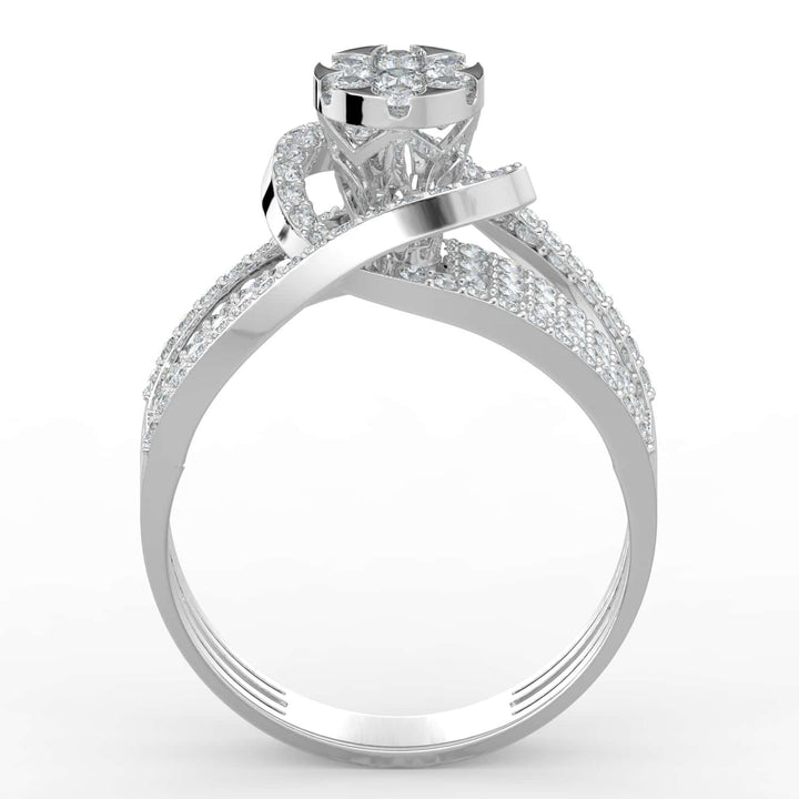 A bold diamond ring featuring a floral cluster center surrounded by a crescent halo, with a wide multi-row pavé-set diamond band.