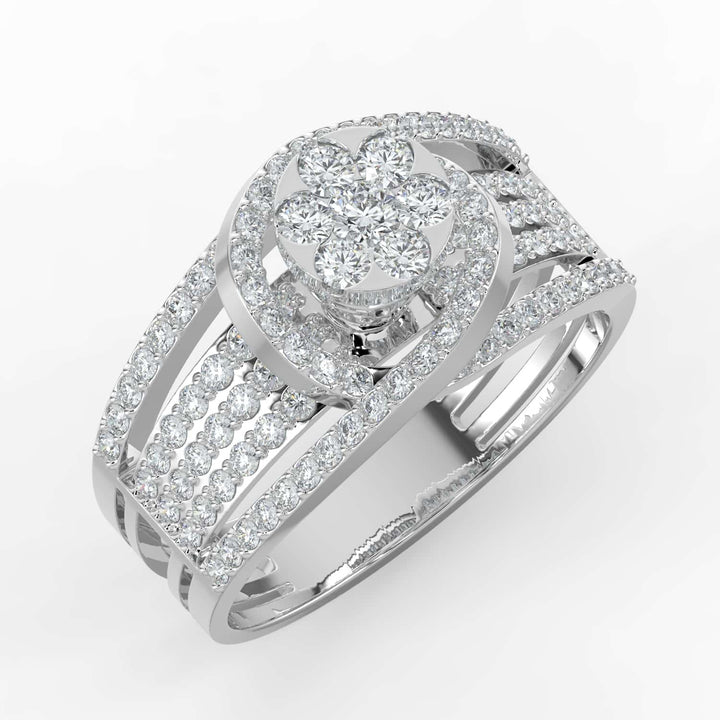 A bold diamond ring featuring a floral cluster center surrounded by a crescent halo, with a wide multi-row pavé-set diamond band.