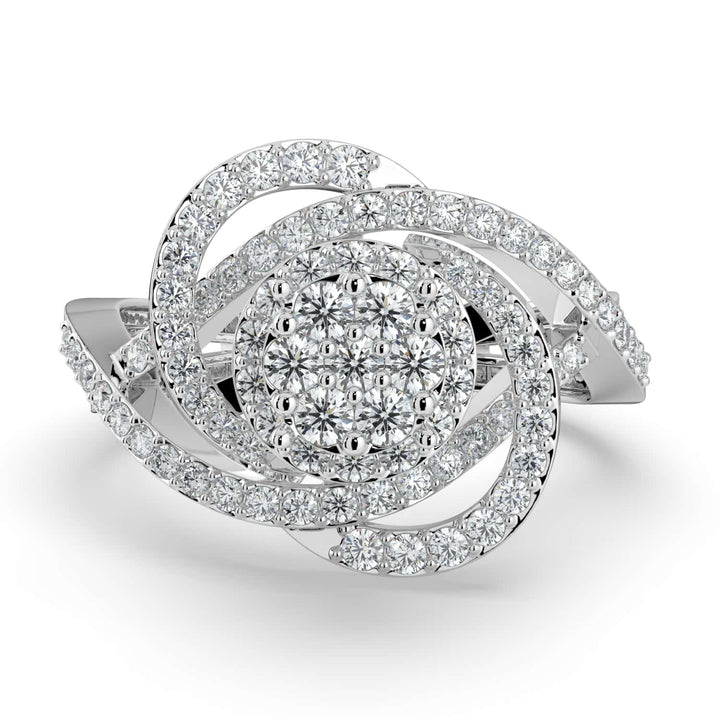 A diamond ring featuring a round cluster center with swirling pavé-set diamond accents and a split band, creating a bold and dynamic design.