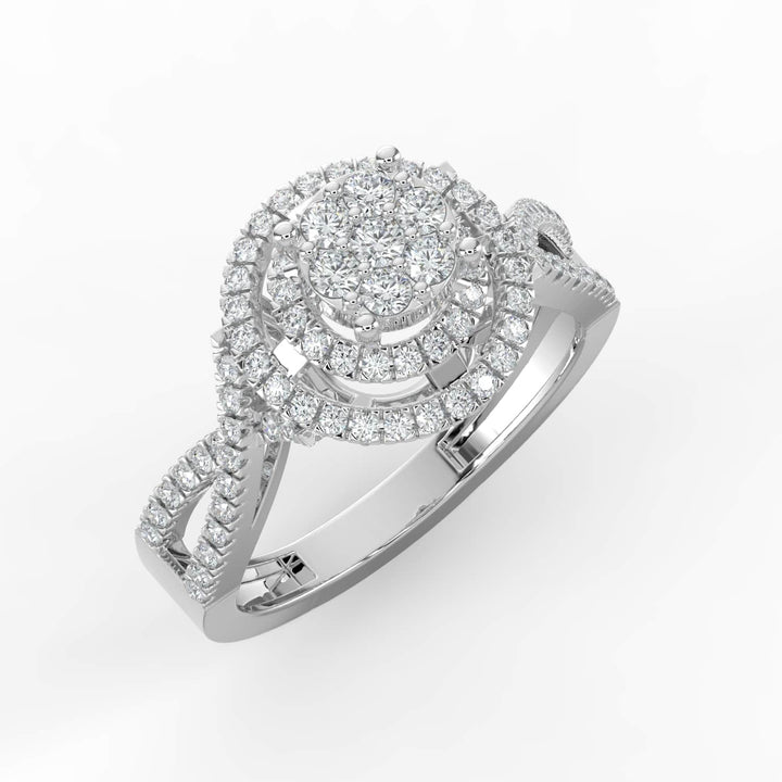 A diamond ring featuring a round cluster center with double halos of pavé-set diamonds, and a twisted diamond-accented band for added elegance.