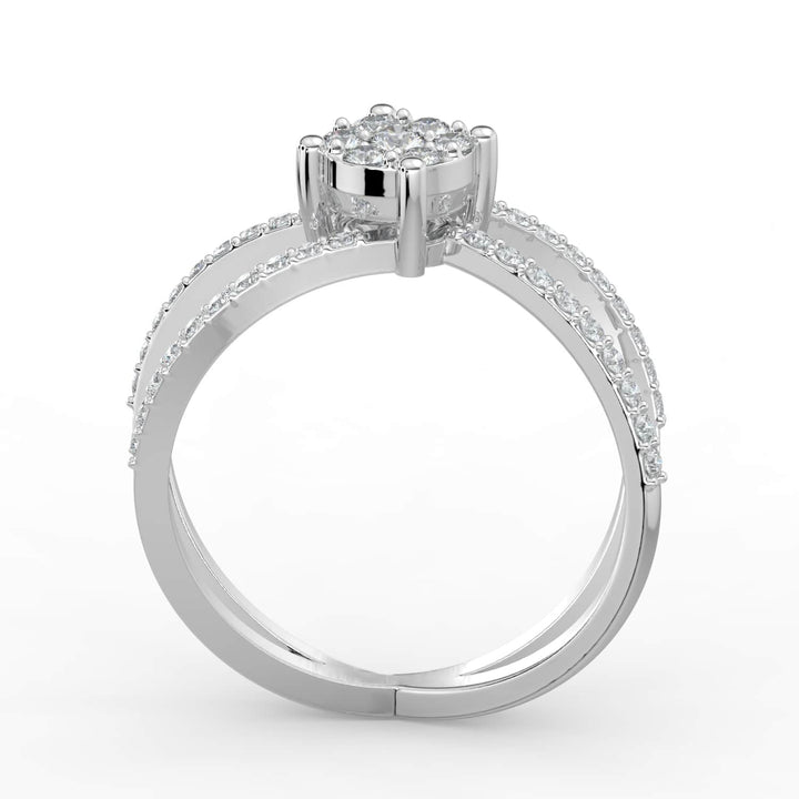 A diamond ring featuring a round cluster center with crisscross pavé-set diamond bands, offering a modern and elegant design.