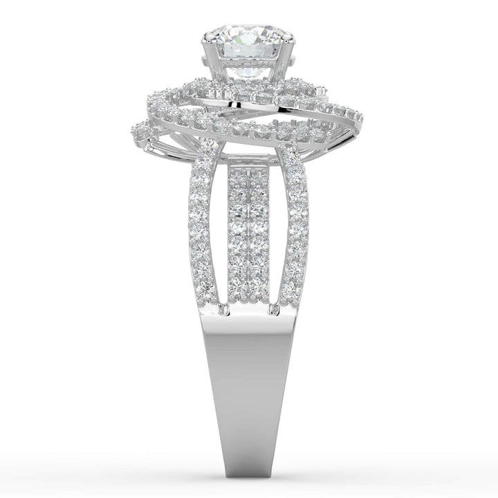 A statement diamond ring featuring a round center stone encircled by spiral halos of pavé-set diamonds, with a multi-row diamond band for added brilliance.