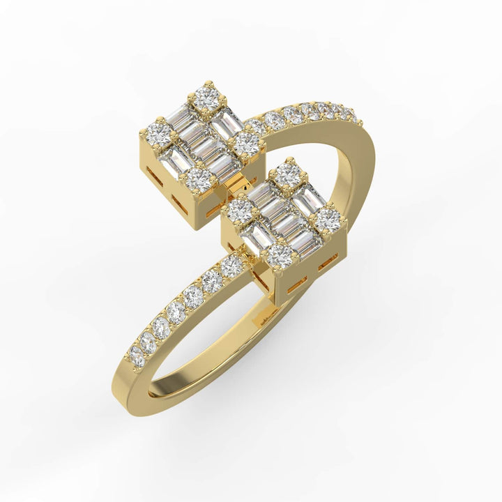 A modern diamond ring featuring two square clusters of baguette and round-cut diamonds on a pavé-set bypass band.