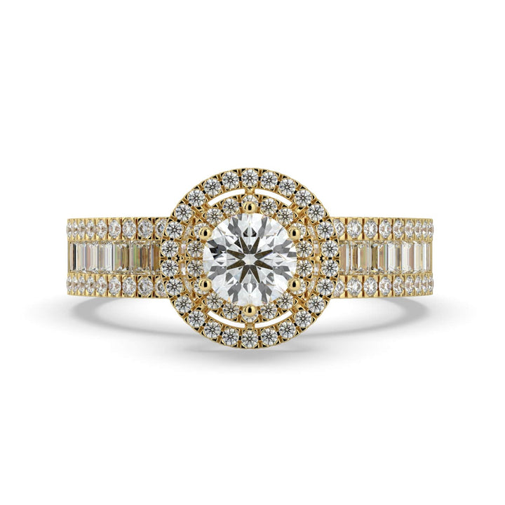 A diamond ring with a round center stone, surrounded by a double halo of pavé-set diamonds, and a band featuring a row of alternating baguette and round diamonds.