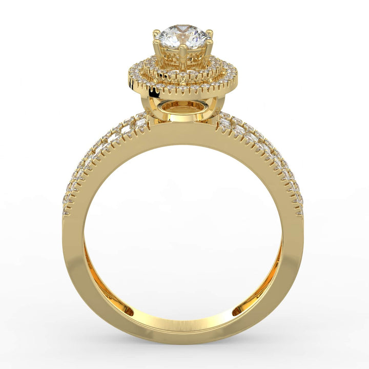 A diamond ring with a round center stone, surrounded by a double halo of pavé-set diamonds, and a band featuring a row of alternating baguette and round diamonds.