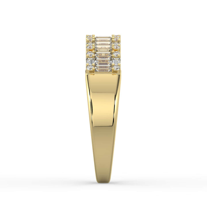 A diamond band featuring a row of alternating baguette and round-cut diamonds, set in a sleek gold