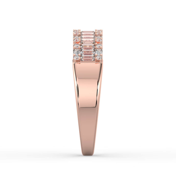 A diamond band featuring a row of alternating baguette and round-cut diamonds, set in a sleek rose gold