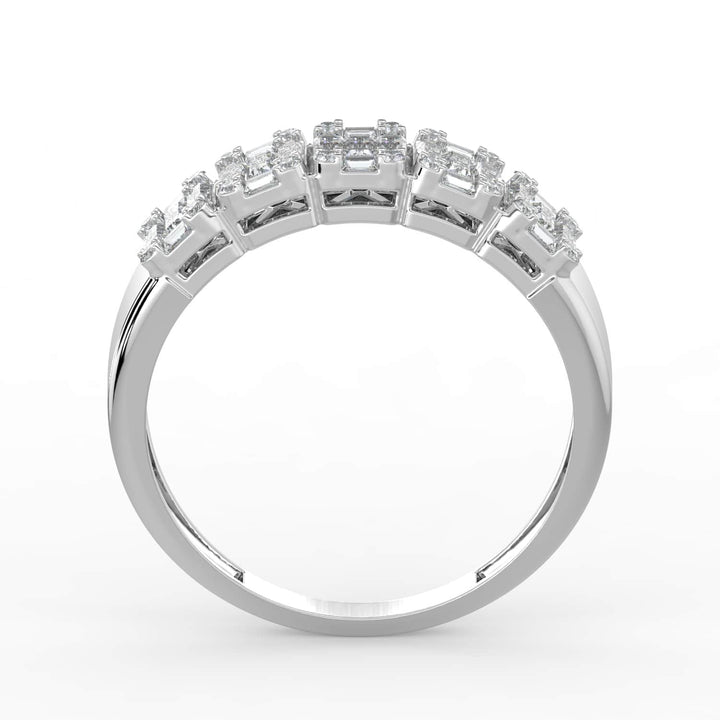 A diamond band featuring a row of alternating baguette and round-cut diamonds, set in a sleek white gold