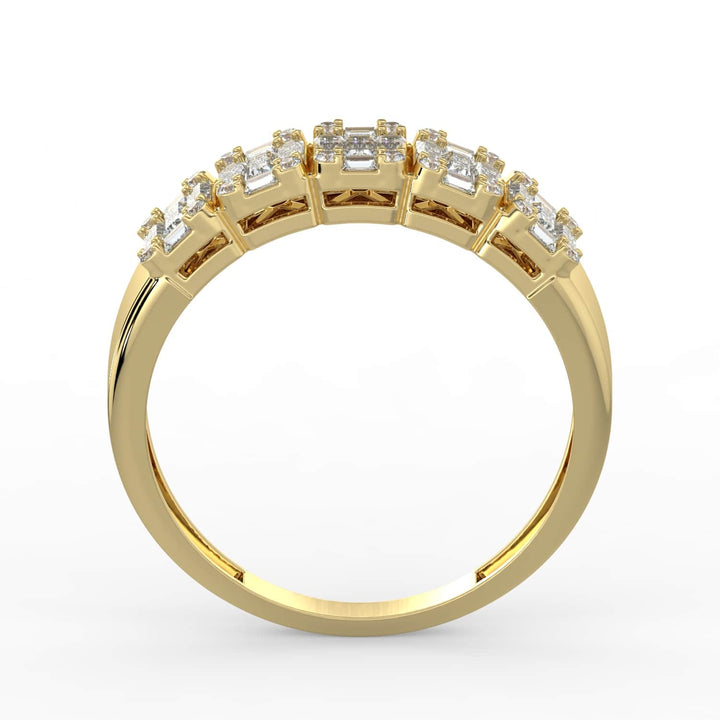 A diamond band featuring a row of alternating baguette and round-cut diamonds, set in a sleek gold