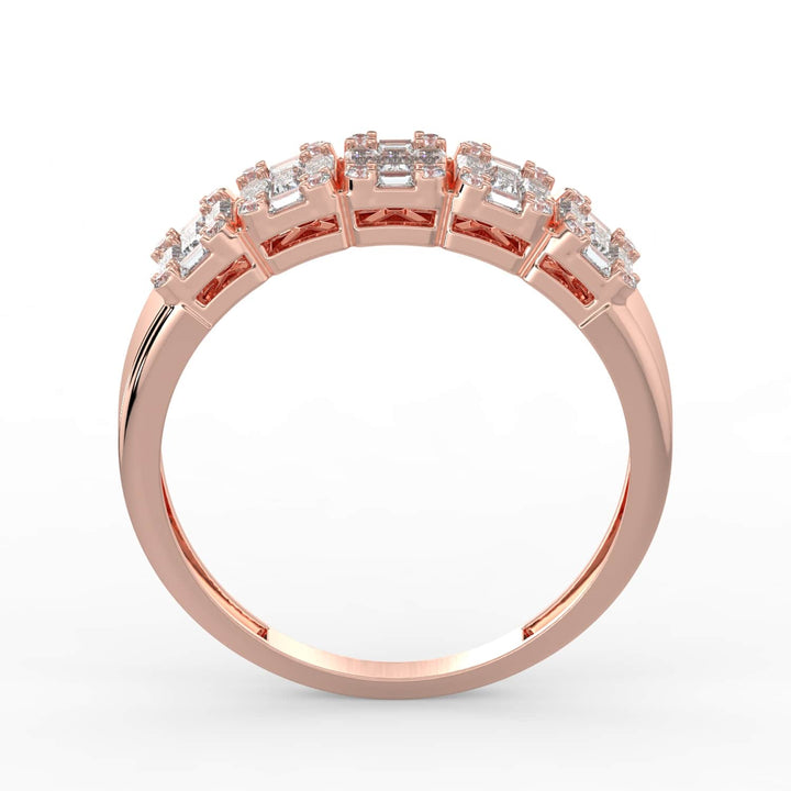 A diamond band featuring a row of alternating baguette and round-cut diamonds, set in a sleek rose gold