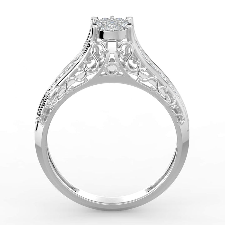 A diamond ring with a round cluster center and intricate filigree details along the band, adorned with pavé-set diamonds.